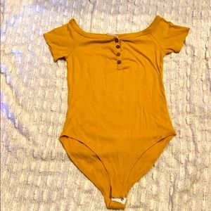 Body suit with snaps